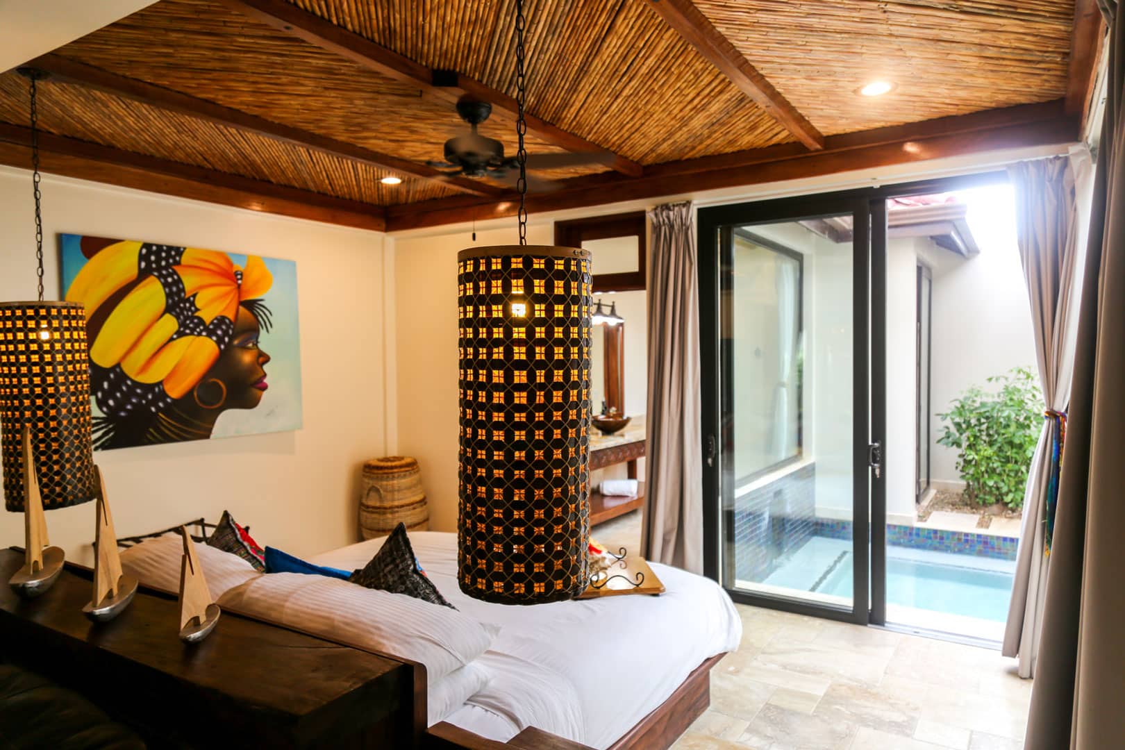 Close up view of the floating lamps inside the master bedroom of the Deluxe Suites at The Resort at Almond Beach